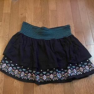 justice layered skirt with shorts underneath, colorful patterns